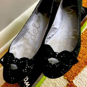 Black eyelet fabric flats